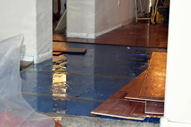 Professional Basement Flood Cleanup technician working in Kansas, OK